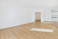 Moderne Erdgeschosswohnung mit Garten, Garage und Blick ins Grüne