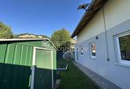Einfamilienhaus Hohenems, Nahe Zentrum, großzügige Terrassenfläche mit Gartenanlage, neuer Zaun mit Sichtschutz, mehrere Außenstellplätze auf privatem Grundstück.