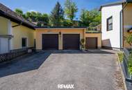 Gepflegtes Einfamilienhaus mit 2 Wohneinheiten, Garten/Terrasse &amp; 3 Garagen in sonnige Ruhelage!