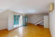 Elegante Dachgeschosswohnung mit Gartenblick, Terrassen und Garage