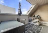 Wohnen über den Dächern von Graz mit Blick auf den Schlossberg: Exklusive Stadtwohnung mit Terrasse