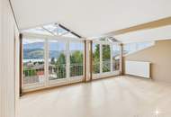 Panorama-Loge: Penthouse mit Seeblick in Seeboden. Carport. Neuwertig.
