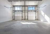 Produktionsfläche mit Büro bzw. Ausstellungsräume | ebenerdige Einfahrt durch drei Sektionaltore | Parkplätze & Luftwärmepumpe