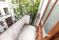 MITTEN IM SIEBTEN | Ost/West ausgerichteter Stil-Altbau mit Balkon | Grünblick | Prachtvolles Jahrhundertwende-Haus