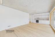 Moderne 3-Zimmer-Erstbezugswohnung mit privatem Garten, großen Fensterfronten und viel Tageslicht