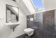 Wohnen über den Dächern von Graz mit Blick auf den Schlossberg: Exklusive Stadtwohnung mit Terrasse