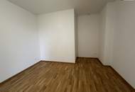 HERRLICHE Neubauwohnung mit Balkon im 1. Obergeschoss – Erstbezug mit exklusiver Ausstattung, Tischlerküche und Tiefgaragenplatz.
