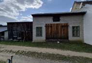 Wohnhaus mit Altbestand und Scheune