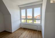 Lichtdurchflutete 3-Zimmer-Wohnung mit neuem Parkettboden, Grünblick und Garage