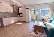 Schlitters: Kernsanierte Dachgeschosswohnung mit Südbalkon, Garten und traumhafter Aussicht