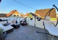 3-Zimmer-Terrassenwohnung samt Garten und eigener Garage
