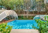 Tirolerhaus mit großem Garten, Pool und Baugrund – attraktive Lage in Scharnitz-Gießenbach