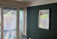 Top ausgestattetes GARTENAPARTMENT mit einer EXTRA TERRASSE und einem TIEFGARAGENPLATZ