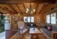 „Wohnen im Einklang mit der Natur – Stilvolles Holzhaus in traumhafter Ruhelage auf unverbaubarem Grundstück“