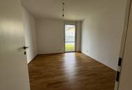 Toppreis - Neubau - Schöne 3 Zimmer Wohnung mit Terrasse und großer Gartenfläche (T 1.3 / EG)