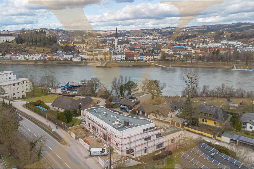 ERSTBEZUG! Traumhafte 4-Zimmer-Wohnung mit herrlichem Donaublick mit Eigengarten &amp; Terrasse zu vermieten!