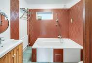 "Ankommen am Promenadenweg: Bungalow im Grünen – nahe Wien mit Potential"