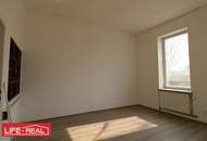 Gartenwohnung in zentraler Lage