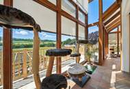 High-end living in a peaceful green location! A feel-good retreat in a class of its own: tradition meets state-of-the-art comfort!