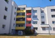 Raumwunder: 3,5-Zimmer-Wohnung mit Loggia und Tiefgarage in grüner Lage