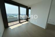 2 Zimmer Erstbezug mit atemberaubenden Blick auf die Donau! Pool, Sauna, Gym inklusive!