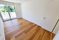 Ein Platz, der mehr kann als wohnen. Geniale Neubauwohnung mit WOW-Effekt! Riesiger Balkon und Terrasse + Privater Dachgarten + Grün wohin das Auge reicht + Luftwärmepumpe!