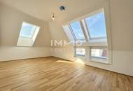 BEIM DONAUUFER: Klimatisierte 3-Zimmer-Dachgeschosswohnung mit sonnigem Glasbalkon