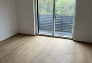 Modernes Zweifamilienhaus mit Gartenwohnungen – Erstbezug!