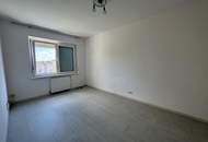 Vermietete Anlegerwohnung mit Balkon und moderner Küche in zentraler Lage