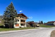 Wohnhaus und vier Bauparzellen