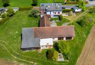 Einfamilienhaus mit großem Grundstück und Nebengebäuden