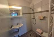 Mehrfamilienhaus mit Geschäftslokal