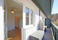 Reizende 3-Zimmer-Wohnung mit 2 Balkonen, gartenseitiger Veranda und Garagenplatz