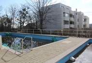 Großzügige Wohnung mit Loggia, Swimmingpool und Garagen in top Lage