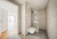 Exklusiver Neubau Erstbezug - 4 Zimmer mit Balkon, Grünblick, Fitness & Garage
