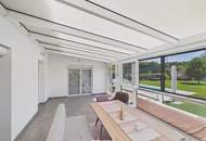 Moderner Bungalow mit Pool, Garage und Traumgarten – Wohnen auf einer Ebene