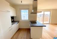 Wunderschöne Dachgeschosswohnung mit großer Terrasse und Wintergarten!