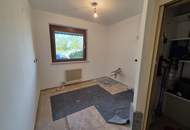 Geräumige 3-Zimmer-Erdgschosswohnung mit großer Einzelgarage!