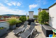 Großzügige Maisonette mit privater 48-m²-Dachterrasse und Panoramablick