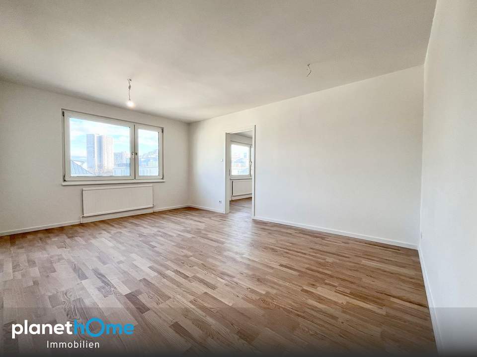 Erstbezug – elegante 3-Zimmer-Stadtresidenz mit Fernblick nahe U1