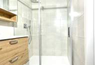Erstbezug - Innenhof-Grünruhelage nur 350m zur U3: moderne 3-Zimmer, XXL-Regendusche, Loggia