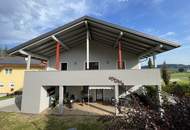 Mehrfamilienhaus mit Garage/Lager/Büro - Dorfwidmung