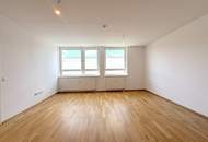 Hofseitig orientierte Zwei-Zimmer-Wohnung mit Einbauküche