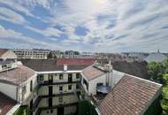 Weitblick, Ruhe & zentrale Lage – Sonnige Altbauwohnung mit Balkon