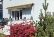 Sonnenverwöhnter Garten trifft ländlichen Charme