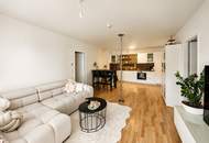 Moderne Gartenwohnung mit Terrasse in neuwertigem Wohnkomplex