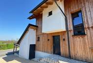 "Ökologisches Holzhaus im Chalet-Stil – Luxus trifft Nachhaltigkeit!"