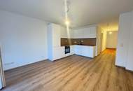 2-Zimmer Neubauwohnung mit Balkon und TG Platz!