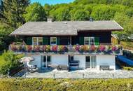 Sanierungsbedürftiges Appartementhaus mit Blick zum Weissensee inkl. 2428 m2 bebaubarem Grundstück