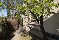 4-Zimmer-Terrassenwohnung mit ca.100m² Garten und TG Stellplatz
